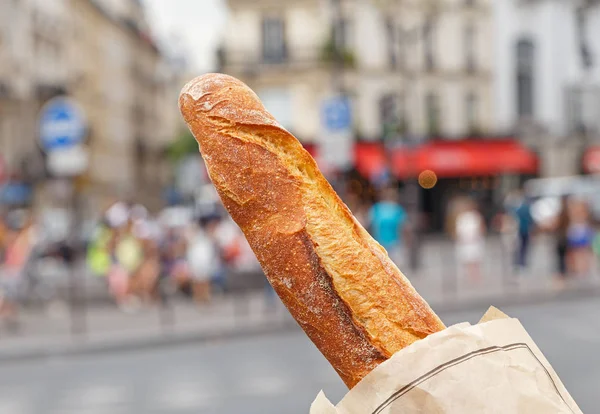 French baguette against street