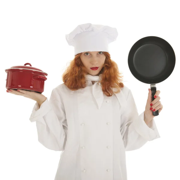 Kvinnliga kock kock med kastruller — Stockfoto