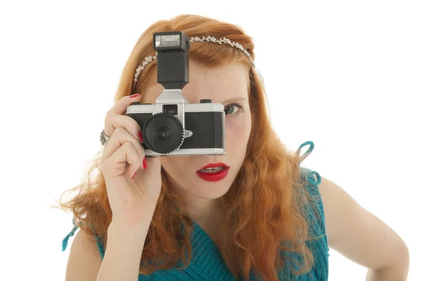 Portrait girl with photo camera and red hair — Stock Photo, Image
