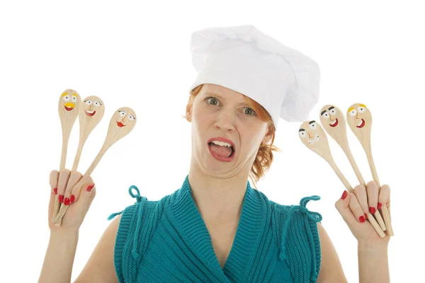 Drôle comme cuisinière femme avec des cuillères — Photo