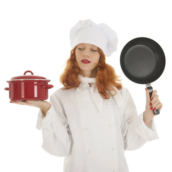 Жіночий кухар з горщиками і сковорідками — стокове фото