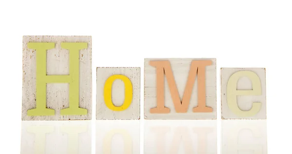 Thuis in houten letters — Stockfoto