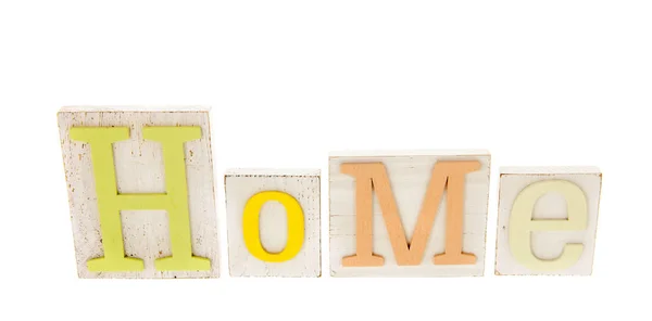 Home in wooden letters — Stock Photo, Image