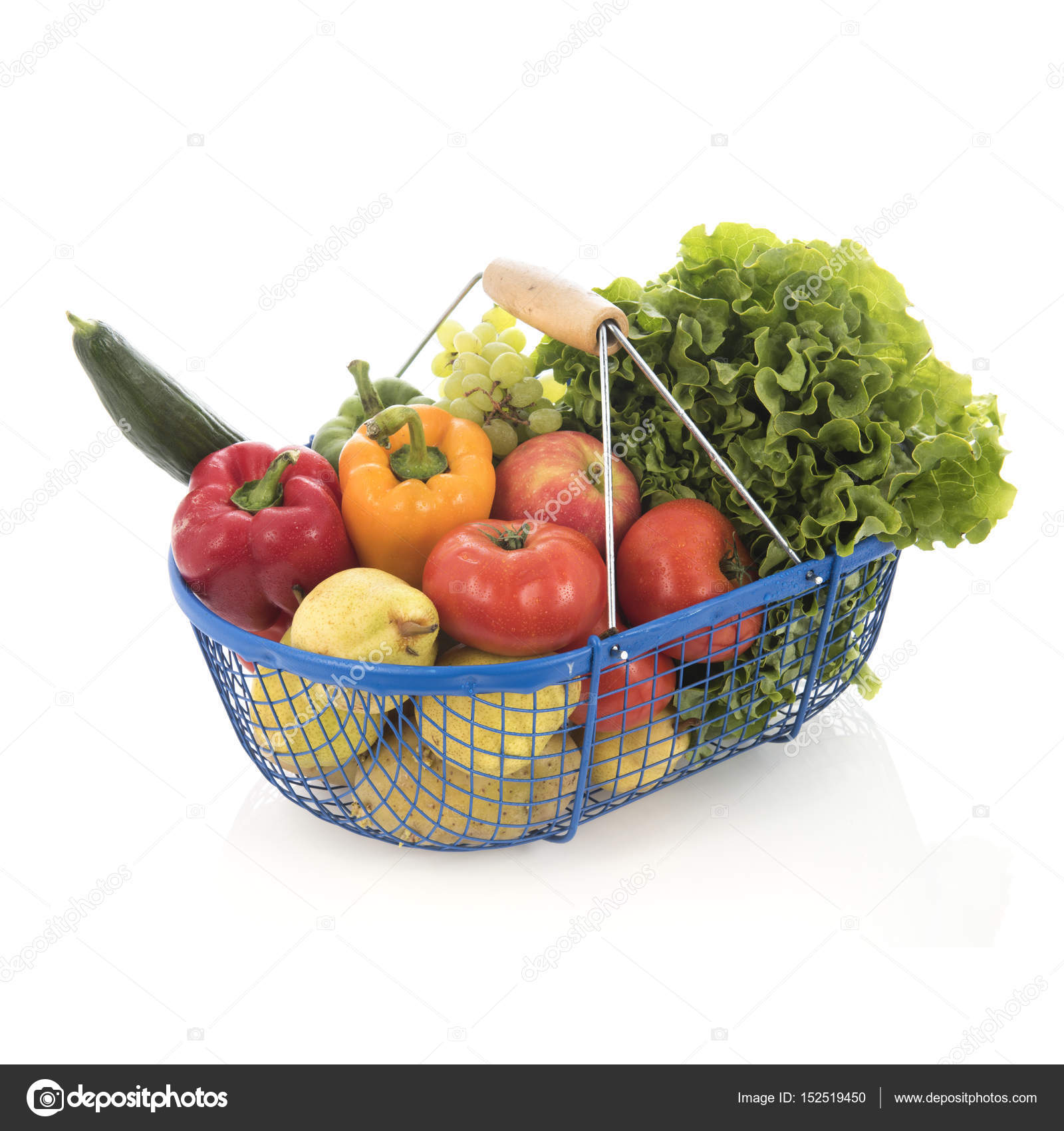 Harvest basket with vegetables and fruit — Stock Photo © ivonnewierink