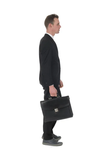 Vista lateral caminando hombre de negocios con maletín — Foto de Stock