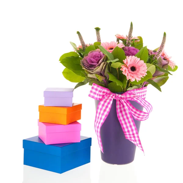 Mixed bouquet flowers and gifts — Stock Photo, Image