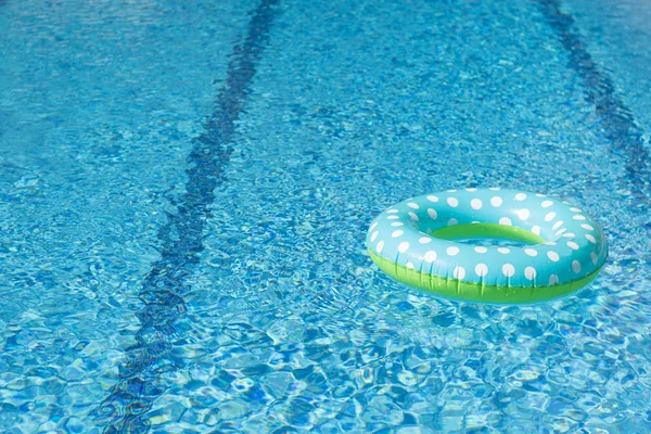 Floating toy in swimming pool — Stock Photo, Image