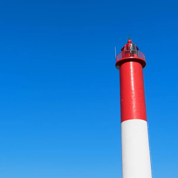 Red and white lighthouse — Stock Photo, Image