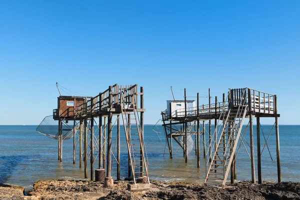 Fisherman huts at the coast — Stock Photo, Image