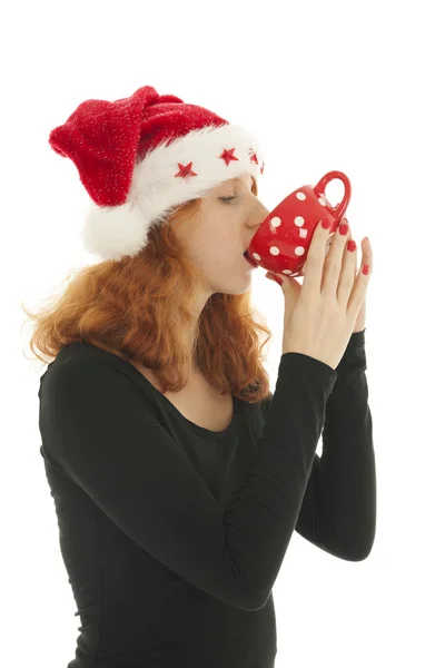 Weihnachtsfrau trinkt Schokolade — Stockfoto