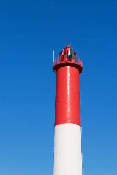 Red and white lighthouse — Stock Photo, Image