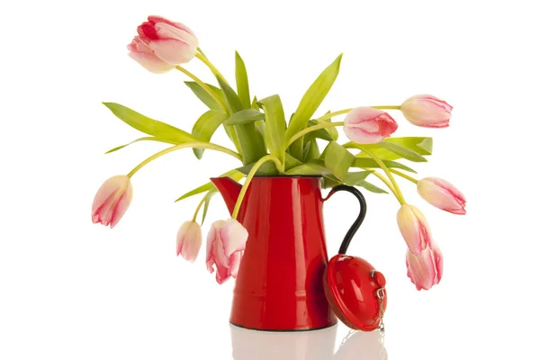 Bouquet tulips in red vase — Stock Photo, Image