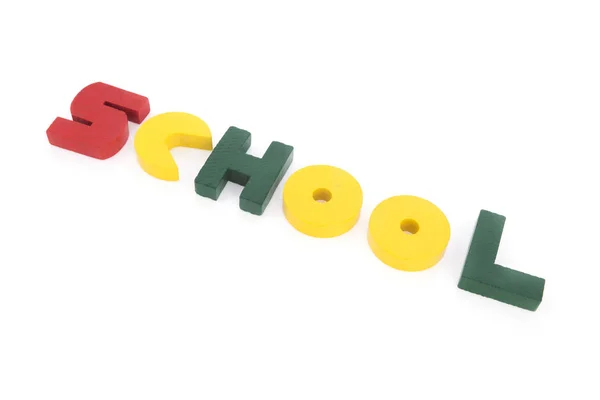 Escola em letras coloridas de madeira — Fotografia de Stock
