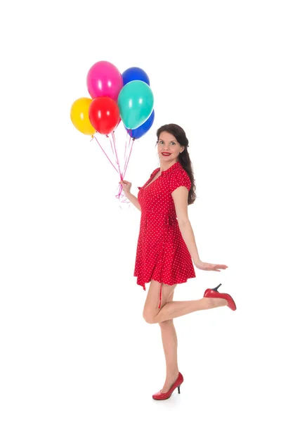 Ung kvinna med ballonger — Stockfoto