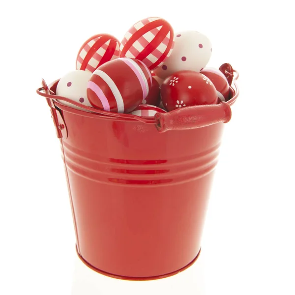 Red bucket easter eggs — Stock Photo, Image