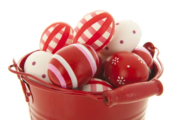 Red bucket easter eggs — Stock Photo, Image