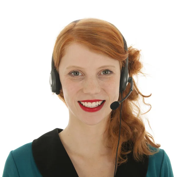 Young red haired woman with head set — Stock Photo, Image