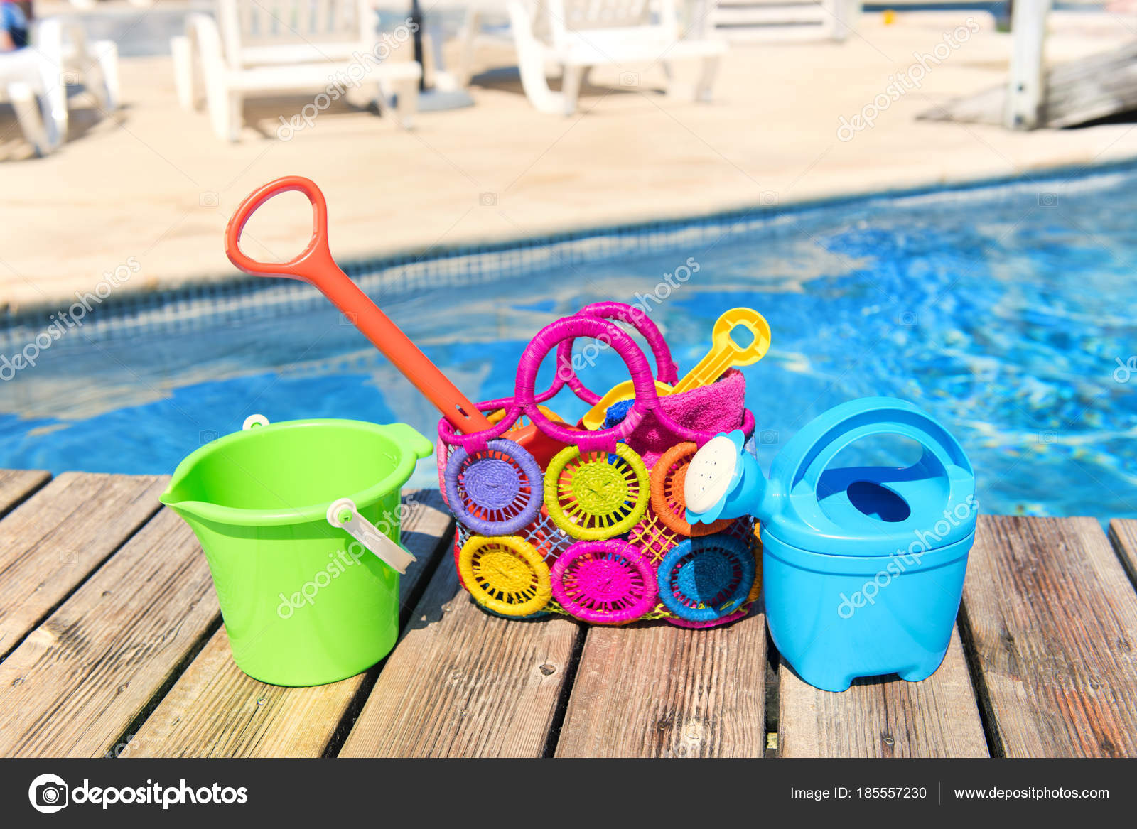 Toys at the swimming pool Stock Photo by ©ivonnewierink 185557230