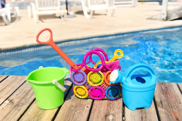 Toys at the swimming pool — Stock Photo, Image
