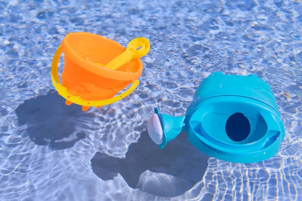 Floating toys in the swimming pool — Stock Photo, Image