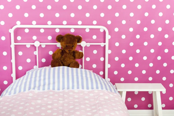 Pink bedroom with toy bear — Stock Photo, Image