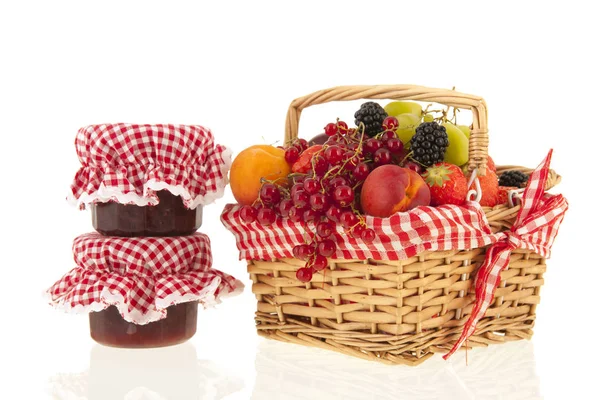 Wicker basket with mixed summer fruit — Stock Photo, Image