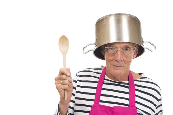 Houseman com avental rosa e panela de cozinha em seu chapéu — Fotografia de Stock