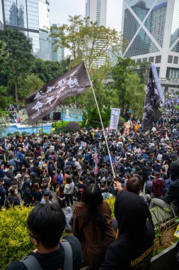 HONG KONG - JANUARY 19 2020: '2020 Karma to Commies - Universal Siege on Communists' rally at Chater Garden, Hong Kong. Which turn into a conflict.