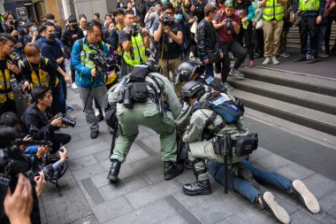 HONG KONG - JANUARY 19 2020: '2020 Karma to Commies - Universal Siege on Communists' rally at Chater Garden, Hong Kong. Which turn into a conflict.