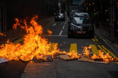 HONG KONG - JANUARY 19 2020: '2020 Karma to Commies - Universal Siege on Communists' rally at Chater Garden, Hong Kong. Which turn into a conflict.