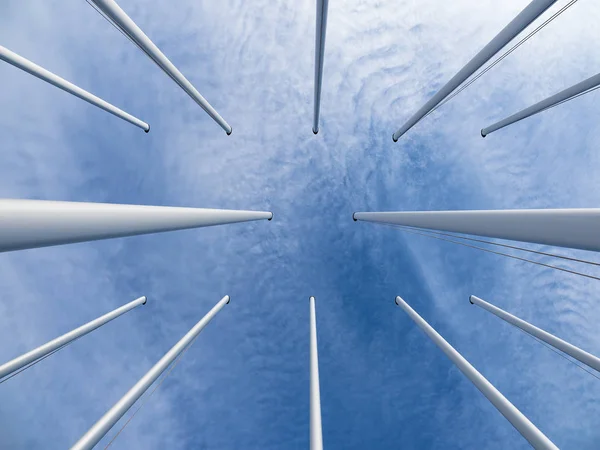 Some flagpoles and clouds in the blue sky — Stock Photo, Image