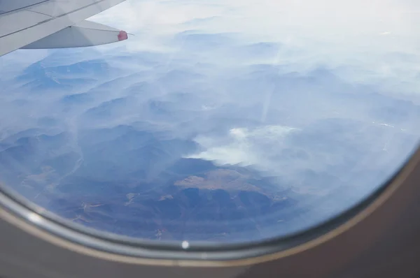 Mountains viewed from airplane somewhere above USA — Stock Photo, Image