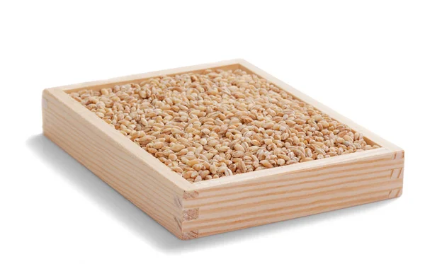 Granos de avena en caja de madera sobre blanco —  Fotos de Stock