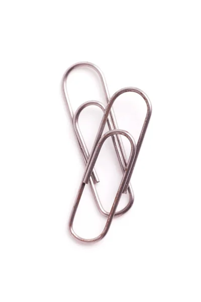 Twee Stalen Paperclip Accessoire Voor Kantoorbenodigdheden Geïsoleerd Witte Achtergrond Bovenaanzicht — Stockfoto