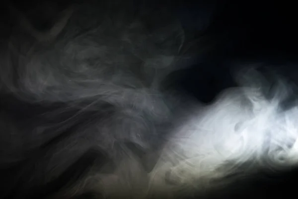 Fumo branco no fundo preto — Fotografia de Stock