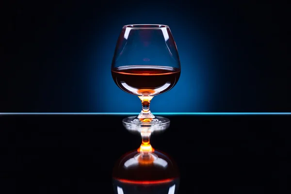 Snifter with brandy — Stock Photo, Image