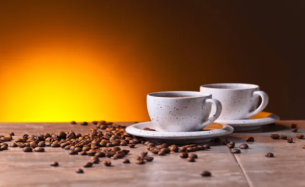 Csésze fekete kávé és a bab — Stock Fotó