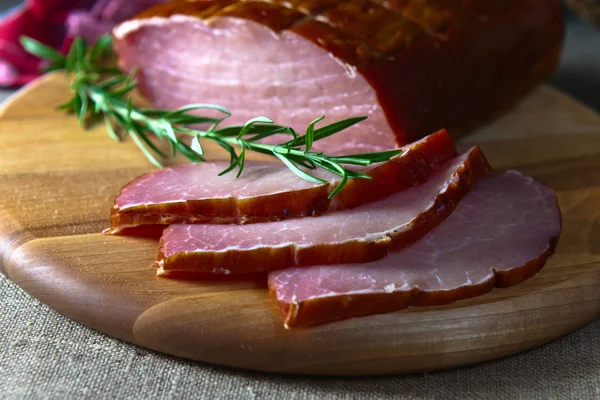 Smoked meat and rosemary — Stock Photo, Image