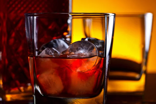 Glass of whiskey with natural ice — Stock Photo, Image