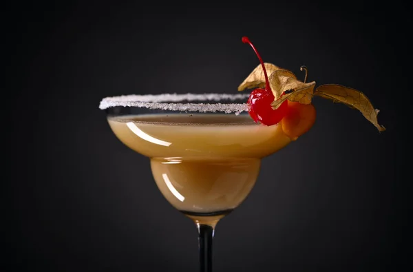 Cocktail with physalis and cherry — Stock Photo, Image