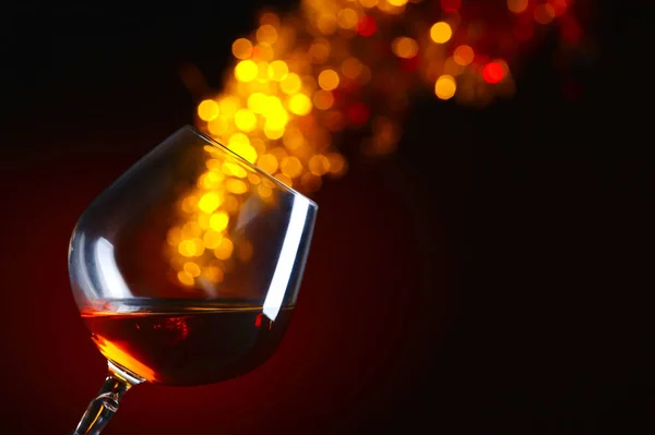 Snifter of brandy on a dark background — Stock Photo, Image