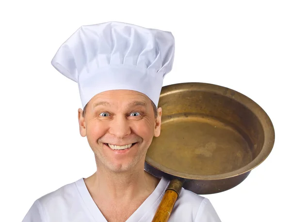 Kock med en stor koppar kastrull på vit — Stockfoto