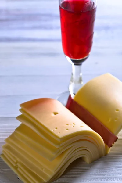Slices of cheese folded like a book — Stock Photo, Image
