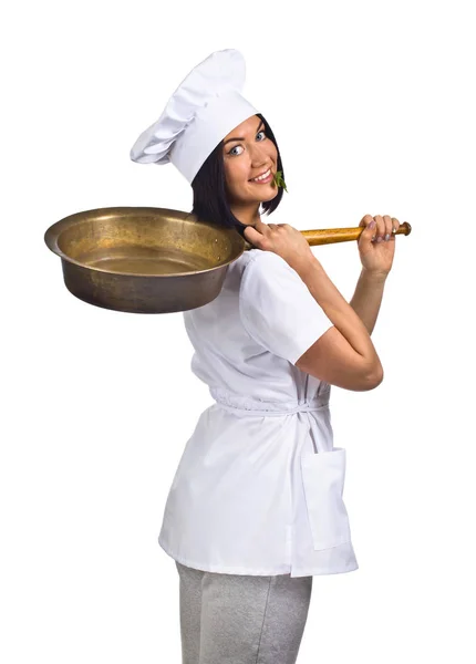 Jovem mulher em uniforme chef com panela isolada em branco — Fotografia de Stock