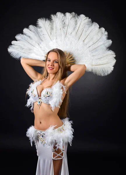 Beauty blonde in white belly dancer costume . — Stock Photo, Image