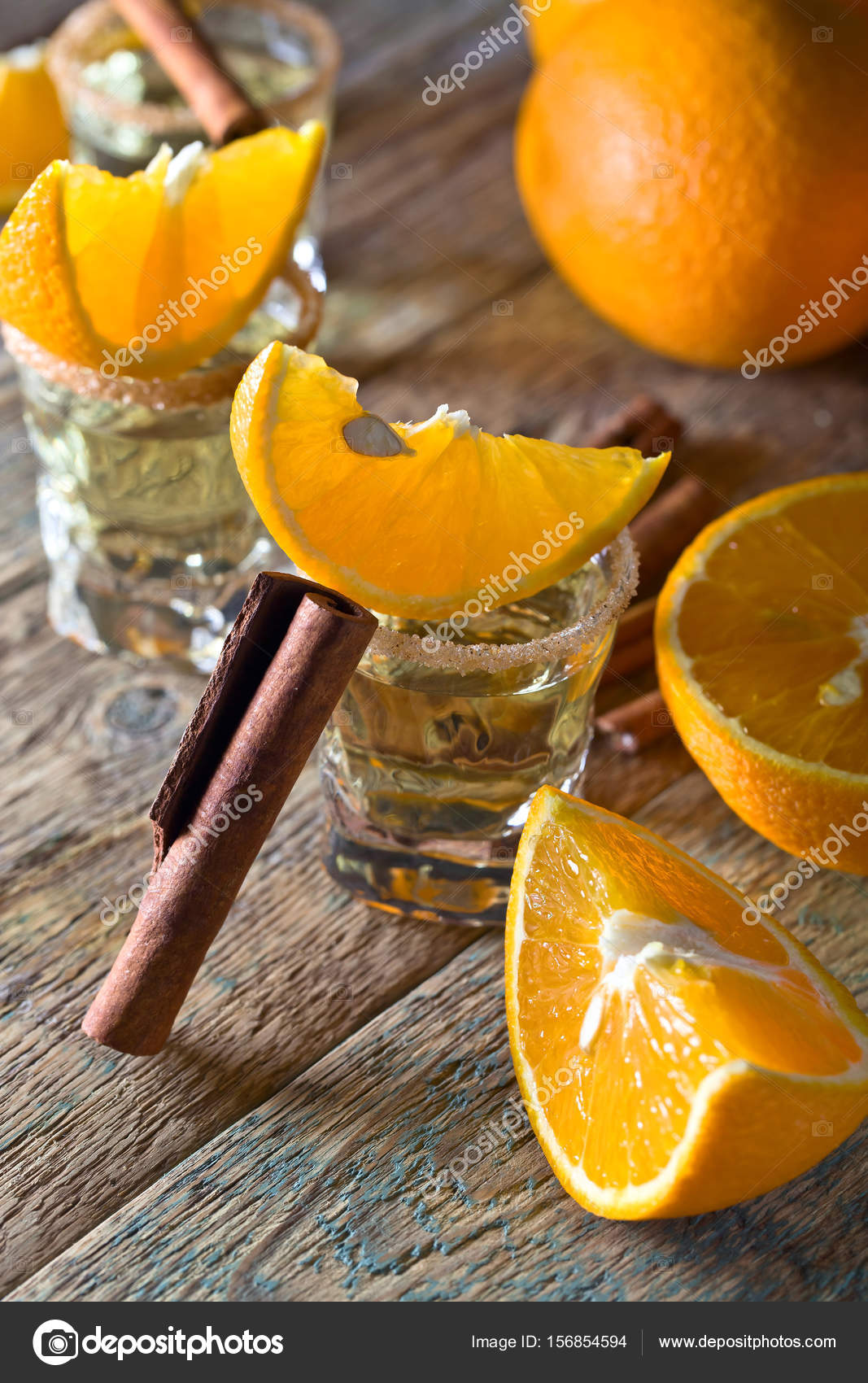 Gold tequila with orange and cinnamon . Stock Photo by ©igorr1 156854594