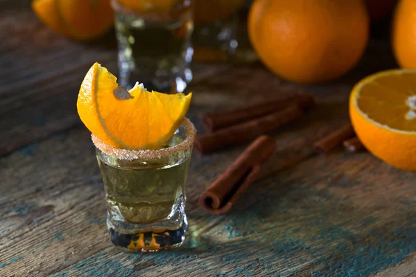 Gold tequila with orange and cinnamon . — Stock Photo, Image