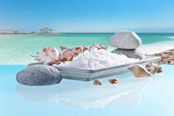 Sea salt on a glass table — Stock Photo, Image