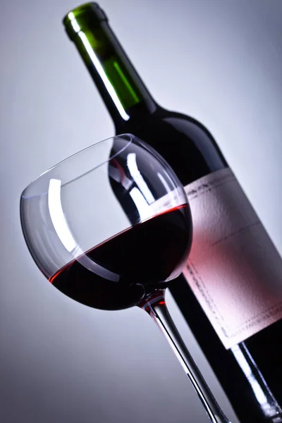 Bottle and glass of red wine . — Stock Photo, Image