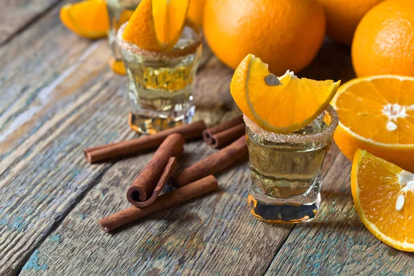 Gold tequila with orange and cinnamon . — Stock Photo, Image